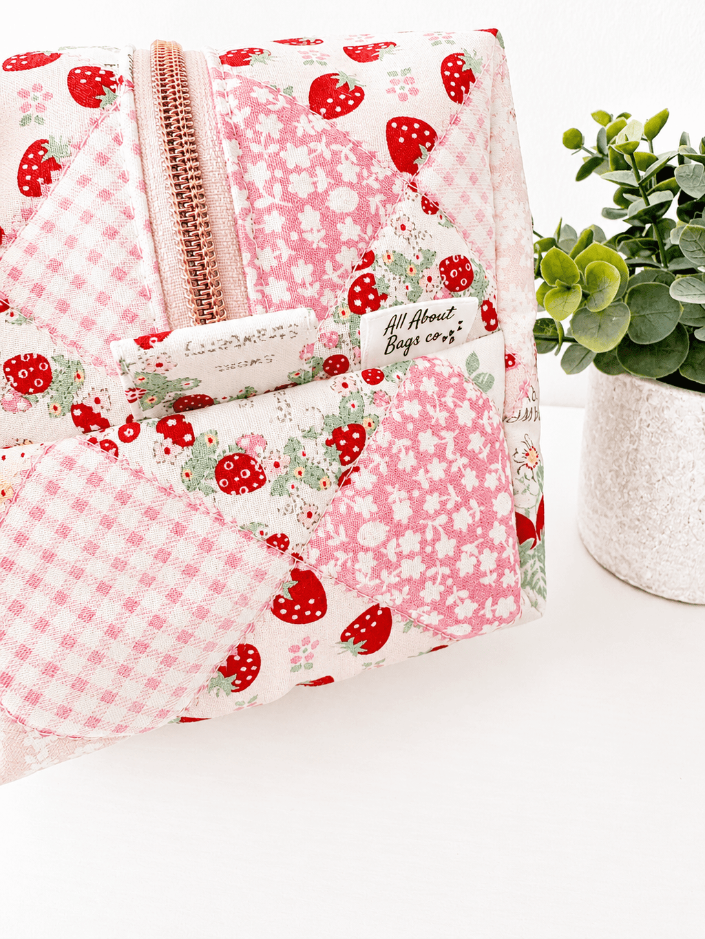 Quilted strawberry patchwork Makeup Bag with water-resistant lining - All About Bags Co