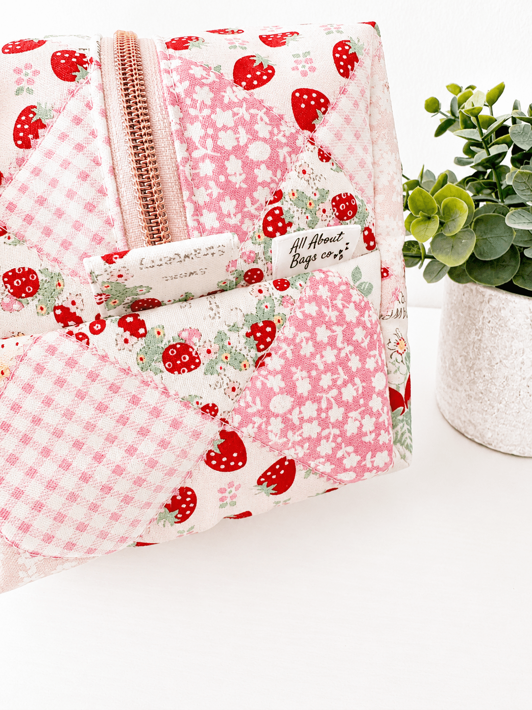 Quilted strawberry patchwork Makeup Bag with water-resistant lining - All About Bags Co